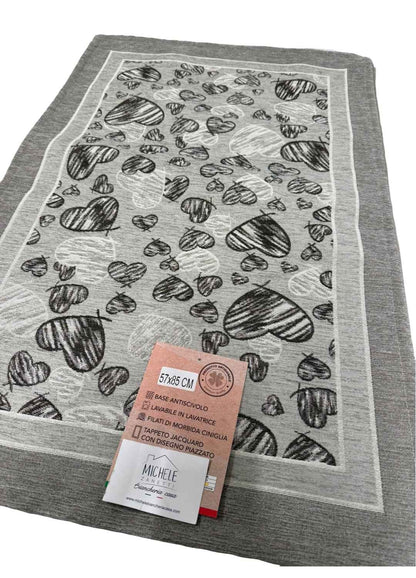 Tappeto in ciniglia con base antiscivolo serie Melody, colore rosso o grigio, disponibile in varie misure